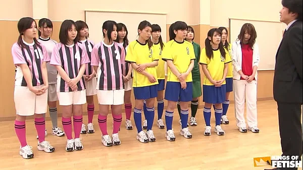 Japanese female team listen and take a lesson from their coach